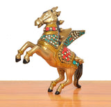 Brass winged flying horse figurine with raised wings, colorful saddle ornaments
