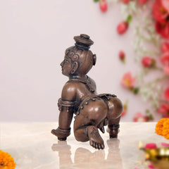 Bal Gopal Krishna laddu idol, dark copper bronze rear view, detailed ornaments, 4 inch