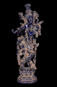 Krishna idol figurine, blue-painted face, detailed crown and jewelry, full view