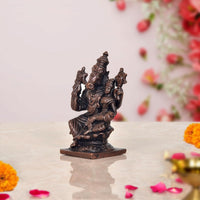 Copper Lakshmi Varaha idol, back/side view with drapery and raised arms on base