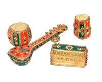 Brass music décor set with painted sitar, harmonium box, and two drums