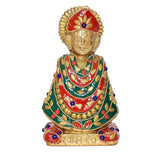 खाटू श्याम जी की पीतल मूर्ति, लाल मुकुट और हरे वस्त्र की डिटेल