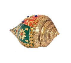 Brass shankh ornament, side view with embossed gold shell and floral beadwork