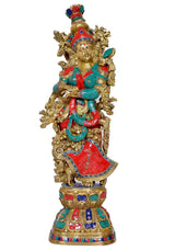 Brass Radha idol statue facing front, jeweled crown, red skirt and teal blouse