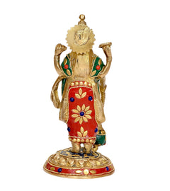 Brass Vishnu idol back view, four-armed, colorful painted details on red and green cloth