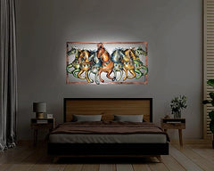 Seven running horses iron wall hanging in rectangular frame, gold and blue