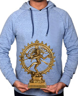 Brass Nataraja Shiva idol statue graphic on light blue hoodie, held by hands
