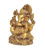 6-inch brass Ganesha figurine with detailed face, halo, and seated four arms