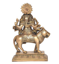 Brass Ganesha statue on horse with decorative sunburst crown, detailed arms