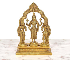 Front view of brass Vishnu with Shridevi and Bhudevi, arched halo and raised hands