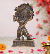 Bronze Narasimha-Vishnu statue with raised hands, lion face relief, standing pose