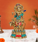 Brass Krishna playing flute idol with cow figure, multicolor jeweled attire, 13 in