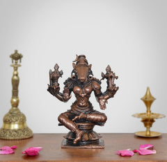 Copper goddess Varahi figurine, eight-armed seated pose, bronze-copper finish