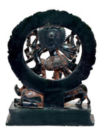 Back view of brass Durga Maa statue with circular halo and lion figures at base