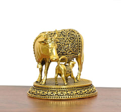 Gold brass cow and calf statue, front 3/4 view, detailed ornamental blanket base