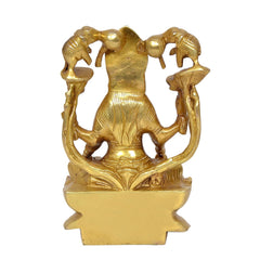 Brass Lakshmi idol, rear view on lotus pedestal, elephant trunk arms visible