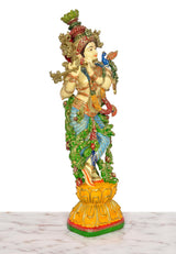 Krishna playing flute statue, three-quarter view, gold flute and jeweled outfit