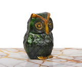 Side view brass owl decor with embossed feather pattern, gold eye and beak accents