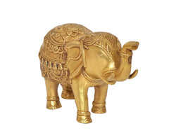Gold brass elephant figurine, rear view with textured patterns on back and tail.