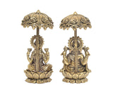 Brass Lakshmi and Ganesha statue pair with ornate chatri, rear side details