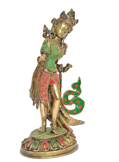 Brass Tara Devi standing statue, angled view showing detailed crown, green-red robe, lotus emblem