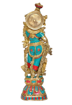 Radha Rani Brass idol statue, rear view with gold disc halo and blue-red dress