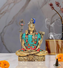 Brass Shiva idol sculpture, seated figure with turquoise-red gemstone-like jewelry