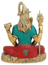 Shiva brass statue, seen from behind; long hair, turquoise chest, red robe; 8 inch