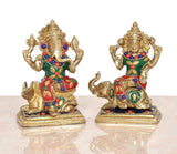 Brass Lakshmi & Ganesha figurines with jeweled painted details and ornate seated poses