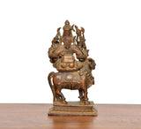 Copper Shiva Parvati on Nandi statue, rear view of seated figure and tail