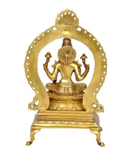 Brass Lakshmi rear view statue with prabhavali frame and seated figure