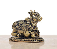 Brass Nandi statue angled view, ornate head, neck collar, and patterned back