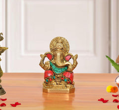 Brass Ganpati Bappa idol, multicolor; raised hands and ornate crown