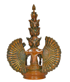 Brass Avalokiteshvara idol front view with multi-headed tiers and fan-shaped arms