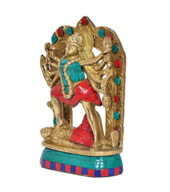 Brass Mahakali Kali statue angled view, raised arms and teal-red mosaic base