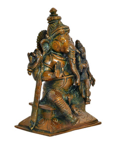 Brass Ganesha with Siddhi idol, rear three-quarter view, raised arms
