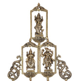 Brass Dashavatara wall hanging showing top deity and two central arched panels