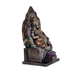 Bronze Kuber statue idol, side view, seated deity with garlands and detailed base