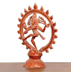 Side view of dancing Lord Shiva brass figurine with detailed halo and pedestal base