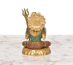 Brass Lord Shiva statue back view, circular golden hair detail, trident and beads