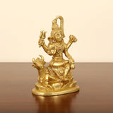 Brass Shiva statue seated on Nandi, golden finish, front view