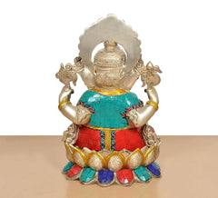 Back view: Brass Ganesha seated on lotus, multicolor robe and ornaments