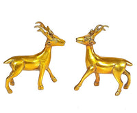 Golden brass standing deer idol with raised antlers and detailed face, 4.5 in
