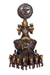 Brass sun chariot statue: seated deity with halo and 7-horse team, brown-gold.