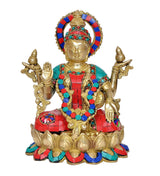Seated Lakshmi goddess idol in gold-tone metal with teal, red, blue jeweled ornaments