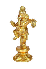 Brass Dancing Ganesha decor idol, golden finish, raised hands, round base