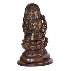 Brass Gayatri Mata idol, three-quarter view of seated goddess and pedestal