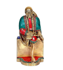 Shirdi Sai Baba bronze idol with teal robe, red accents, seated hands and garlands