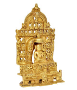 Brass Mahavir Swami statue with raised canopy and carved arched frame