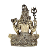 Rear view brass Lord Shiva idol with long hair, trident beside seated base